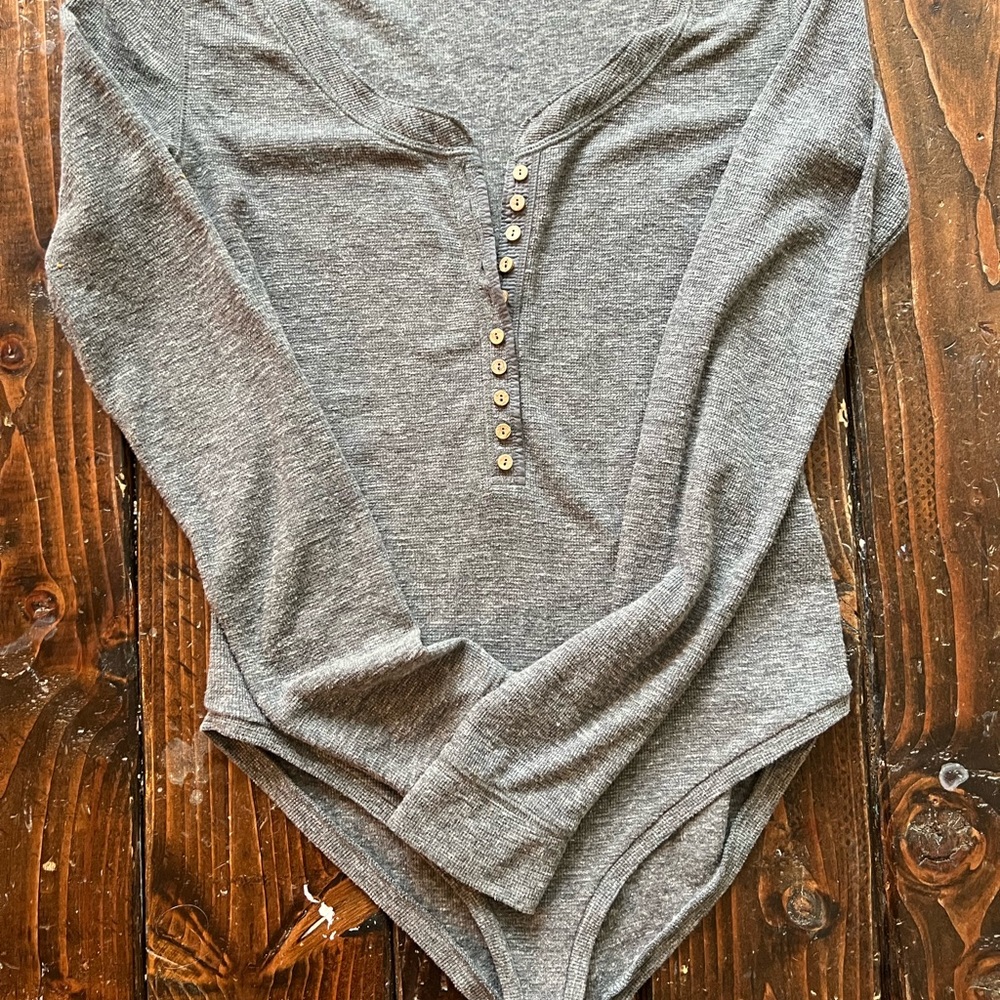 Free people intimates. S. Bodysuit. Snap closure. Long sleeve flannel material.
